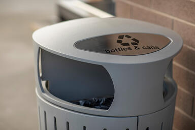 Dispatch Litter & Recycling Receptacle shown in split-stream configuration with 