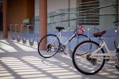 Trio Bike Racks shown with Aluminum Texture powdercoat at Claremont McKenna