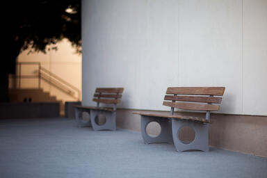 Leda Benches shown in 6 foot, backed configuration with Aluminum Texture