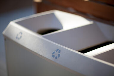Detail of Transit Litter & Recycling Receptacle cast aluminum lid with Aluminum
