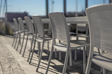 Detail of Avivo Chairs with White Texture powdercoat and Riva perforation