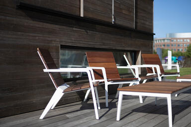 Vaya Chairs with White Texture powdercoated frame and FSC® 100% Cumaru hardwood 