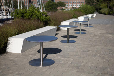 Column Tables with 36" round table tops in Stainless Steel with Sandstone finish