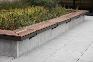 Vector Seating System in Slate Texture powdercoat, shown with FSC® 100% Cumaru
