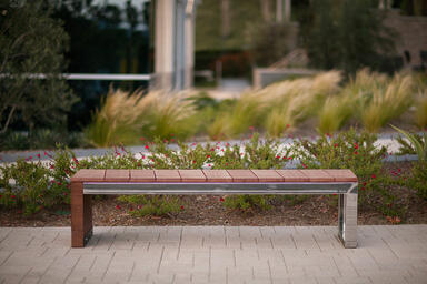 Duo Bench shown with Polished Stainless Steel frame and FSC&reg; 100% hardwood