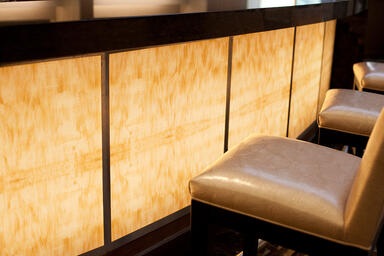 Bar front in backlit ViviStone Honey Onyx
