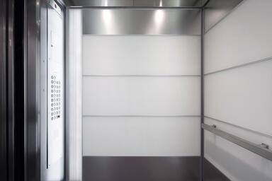 LEVELe-107 Elevator Interior with Capture panels in ViviChrome Chormis glass 