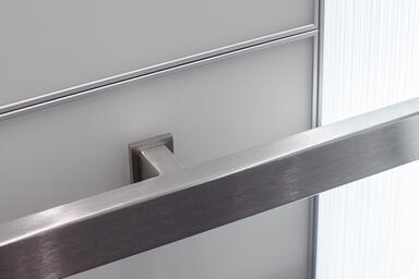 Rectangular Handrail in Satin Stainless Steel shown in LEVELe-107 Elevator 