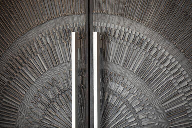 Detail of Bonded Metal Doors in Bonded Nickel Silver with Dark Patina and Corona