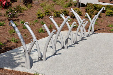 Bike Garden Bike Racks shown in cast-in-place configuration Aluminum Texture