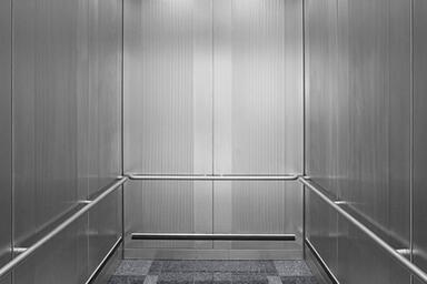 LEVELc-1000A Elevator Interior in Stainless Steel with Sandstone finish 