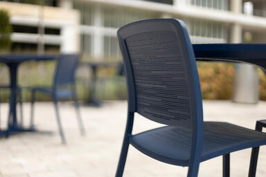 Detail of Avivo Chair with custom Cobalt Texture powdercoat and Riva perforation