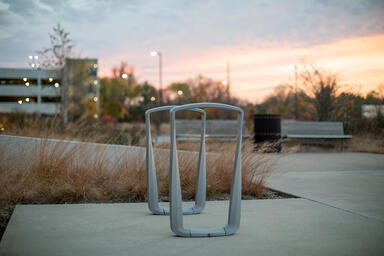 Twist Bike Racks with Aluminum Texture powdercoat; Knight Benches also shown