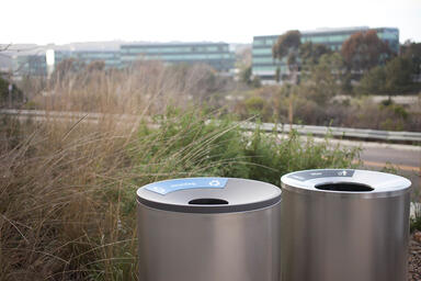 Universal Litter & Recycling Receptacles shown in 36 gallon, top opening 
