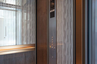 LEVEL-105 Elevator Interior with customized panel layout: Capture panels
