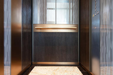 LEVEL-105 Elevator Interior with customized panel layout: Capture panels