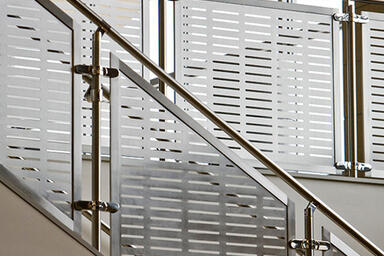 Railing infill shown in Stainless Steel with custom perforation 