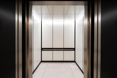LEVELe-105 Elevator Interior; Capture panels in ViviChrome Chromis glass