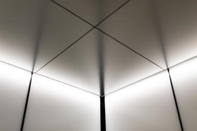 LEVELe-105 Elevator Interior; Capture panels in ViviChrome Chromis glass