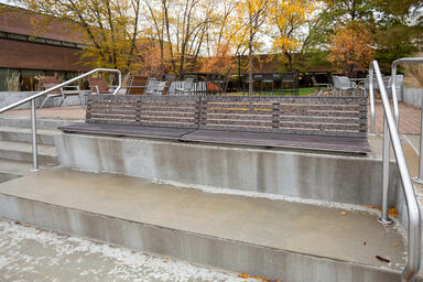 Knight Benches in backed configuration with Aluminum Texture powdercoated frames