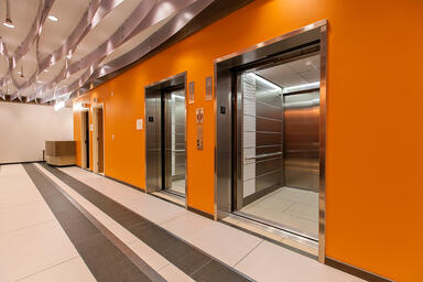  LEVELe-103 Elevator Interior with panels in Stainless Steel with Seastone 