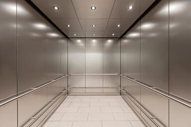 LEVELc-1000 Elevator Interior in Stainless Steel with Seastone finish