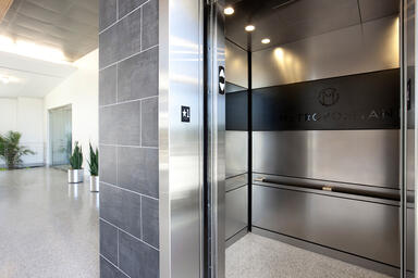 LEVELe-104A Elevator Interior; panels in Stainless Steel with custom finish