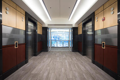 Wall panels shown in Stainless Steel with Satin finish and custom Eco-Etch 