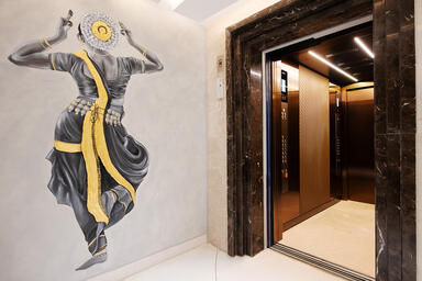 LEVELe-105 Elevator Interior with customized panel layout; Bonded Bronze