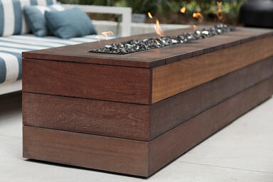 Custom fire table shown with FSC® 100% Jatoba hardwood slats