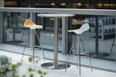 Column Table in bar-height configuration with 30&rdquo; round tabletop in Stainless