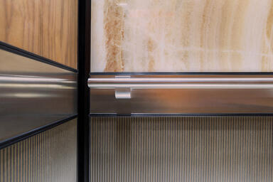LEVELe-106 Elevator Interior with customized panel layout; Capture panels