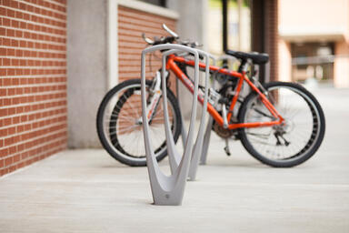 Trio Bike Racks shown with Aluminum Texture powdercoat