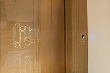 Elevator doors in Fused Nickel Bronze with Diamond finish at Private Residence