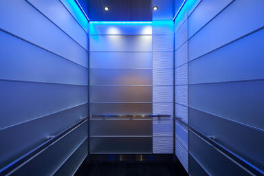 LEVELe-103A Elevator Interior; Capture panels in ViviChrome Chromis glass 
