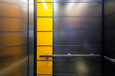 LEVELe-103 Elevator Interior with Capture panels in ViviChrome Chromis glass