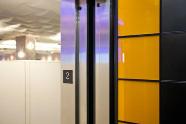 LEVELe-103 Elevator Interior with Capture panels in ViviChrome Chromis glass 