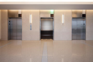 LEVELe-104 Elevator Interiors with Capture panels in ViviChrome Chromis glass 