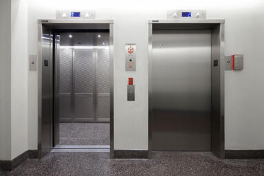 LEVELc-2000N Elevator Interior with inset panels in Stainless Steel 