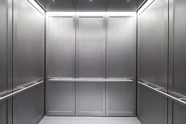 LEVELc-2000 Elevator Interior with inset panels in Stainless Steel