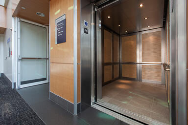 LEVELc-2000N Elevator Interior with inset panels in custom color