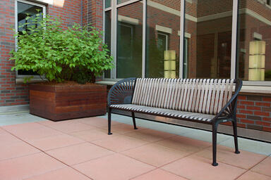 Copenhagen Bench shown with Black Texture powdercoated frame and FSC 100% Ip&eacute; 