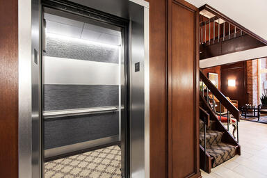 LEVELe-104 Elevator Interior with main panels in Bonded Aluminum 
