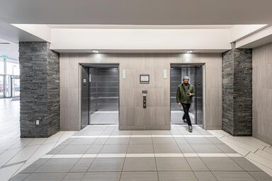 LEVELe-103 Elevator Interiors with Capture panels in ViviGraphix Graphica glass