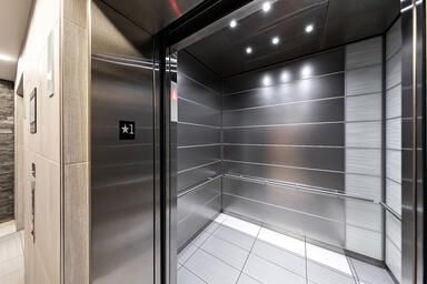 LEVELe-103 Elevator Interior with Capture panels in ViviGraphix Graphica glass