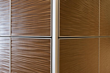 LEVELe Wall Panel System: Bonded Bronze, Natural Patina, Kalahari pattern.