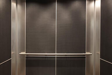 LEVELe-102 Elevator Interior with customized panel layout; Capture panels 