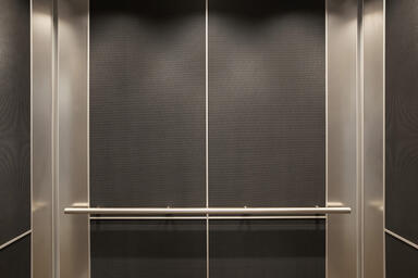 LEVELe-102 Elevator Interior with customized panel layout; Capture panels 