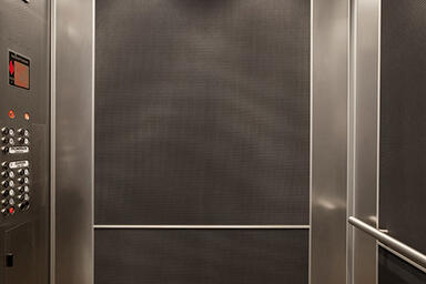 LEVELe-102 Elevator Interior with customized panel layout; Capture panels