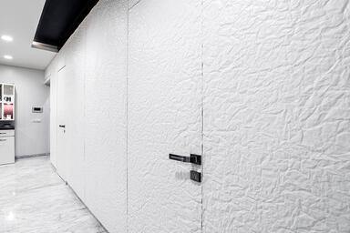 Wall and doors in Bonded Quartz, White with Crinkle pattern